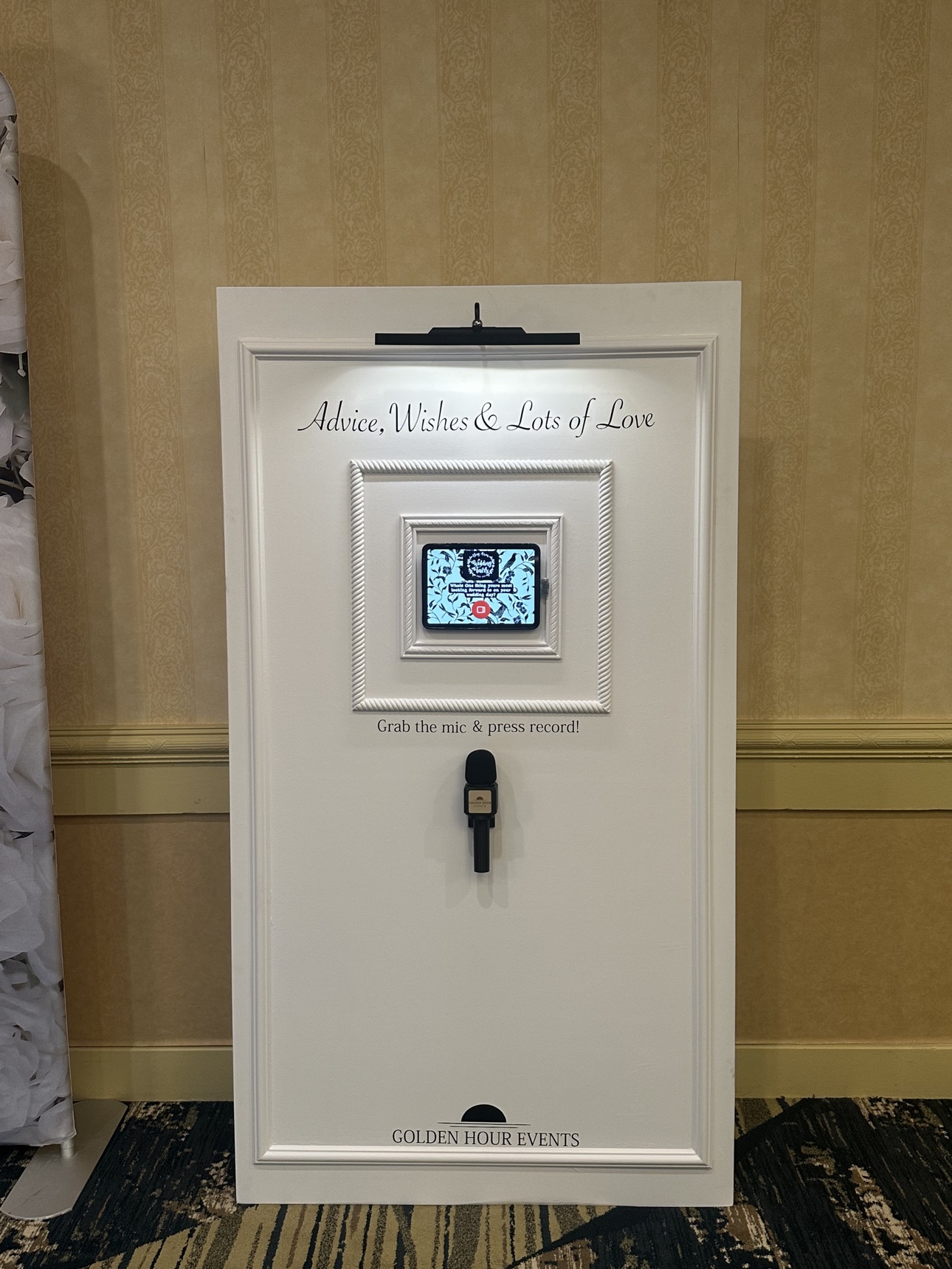 Golden Hour Events video guestbook station with a recording screen and microphone